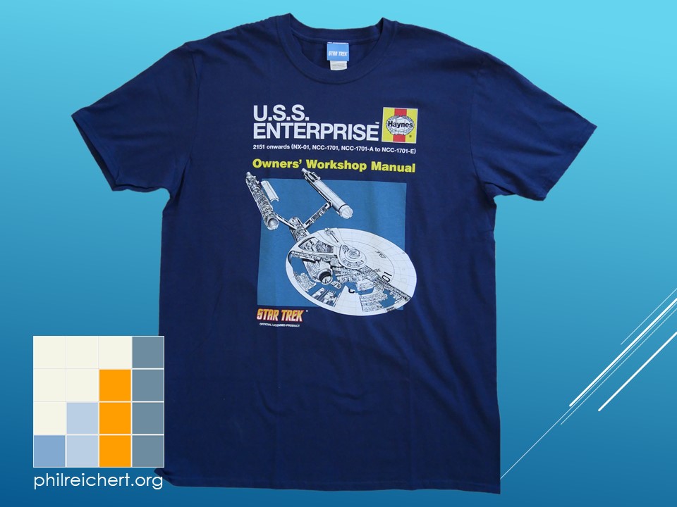 Front view of the Star Trek USS Enterprise Haynes Owner’s Workshop Manual T-shirt laid flat, showing the full technical-style graphic