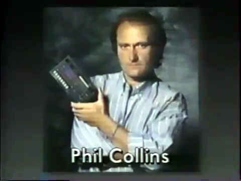 Phil Collins holding Yamaha QY10