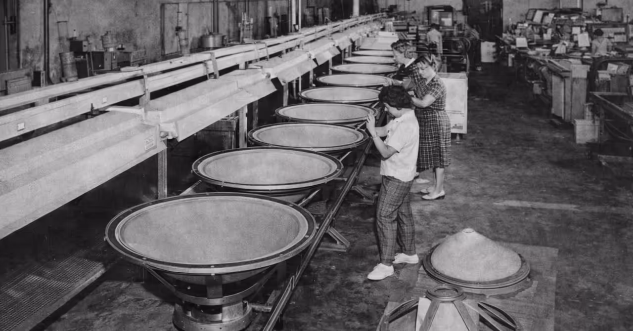 Reconstructed factory scene showing workers assembling giant Electro-Voice 30W 30-inch woofer cones on a production line at the Electro-Voice plant